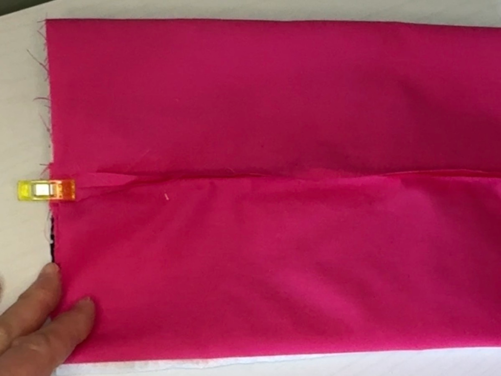 lining folded and clipped on a boxy bag
